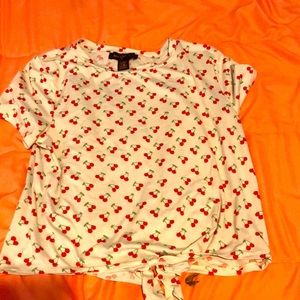 I’m selling a cherry shirt and it’s very cute and u can where it when it’s hot